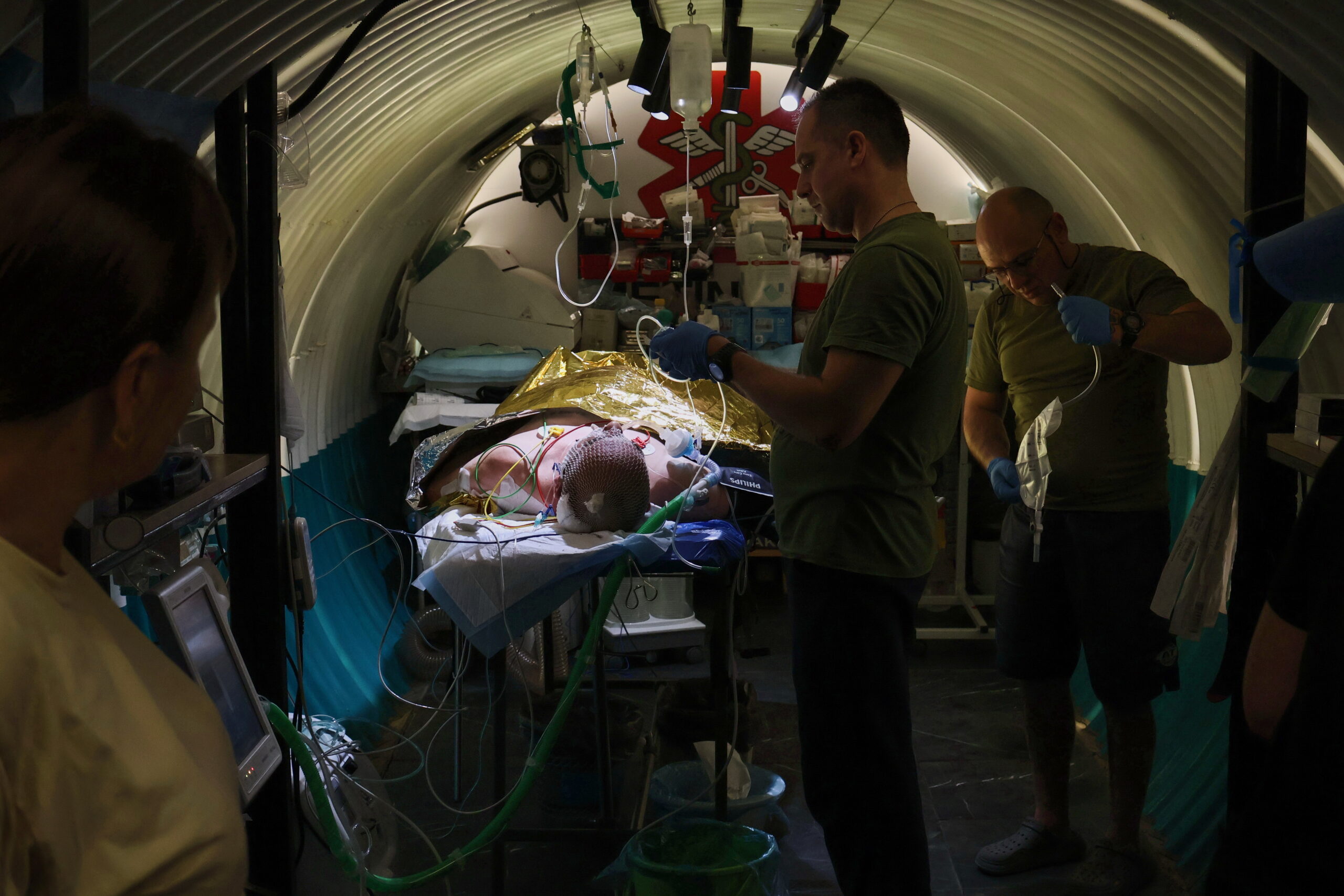 Drones buzz overhead, troops hunker underground in Ukraine's hellish kill zone